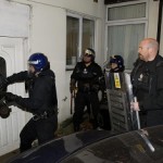 About Chicago Police Arrest 140 in Raids on Gangs