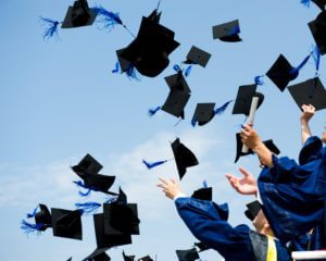 Throwing Graduation hats in the sky