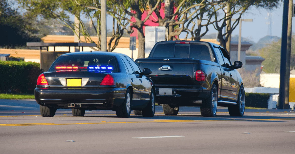 Police car stopping a truck
