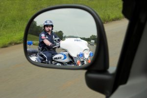 cop in side mirror