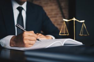 lawyer signing document